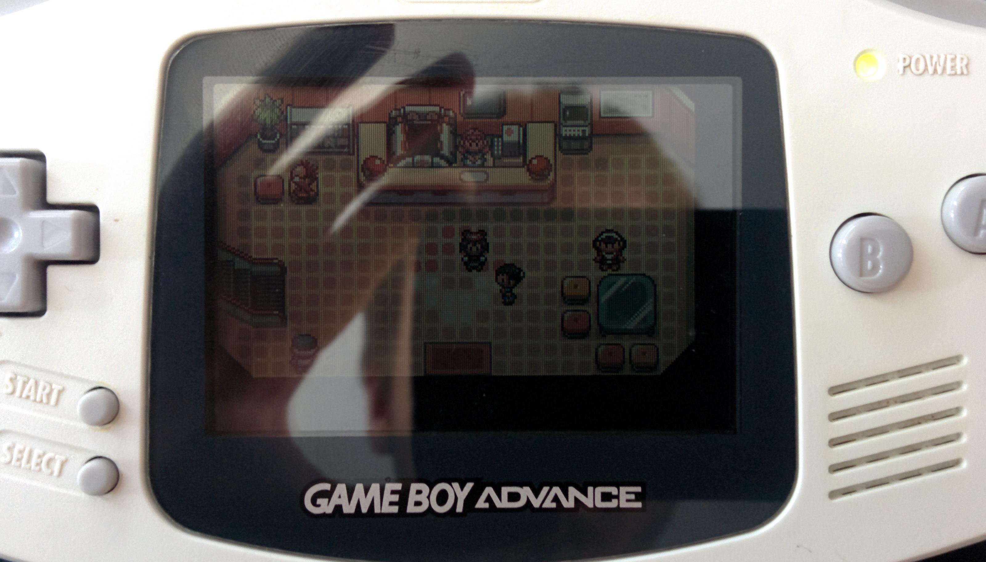 Photograph of an AGB-001 showing a Pokemon center from Pokemon Sapphire